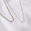 The Carmel Necklace features a link chain with a fixed pearl - available in gold or silver